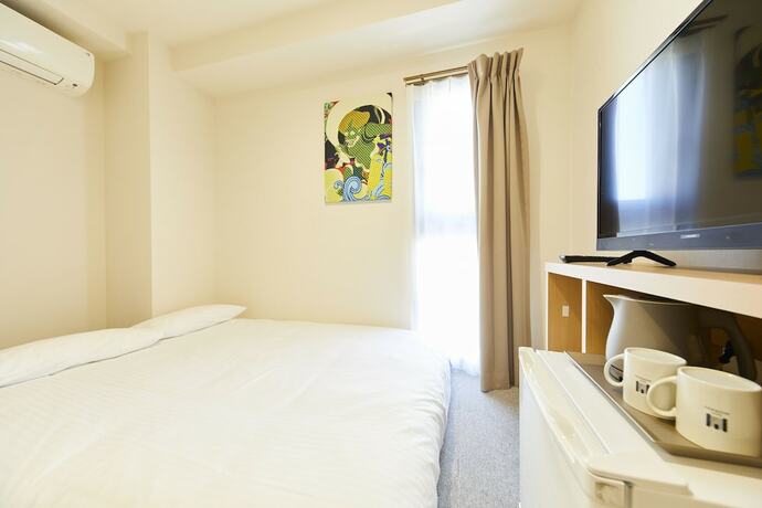 Imagen de la habitación del Hotel GATE STAY hotel Osaka Namba. Foto 12