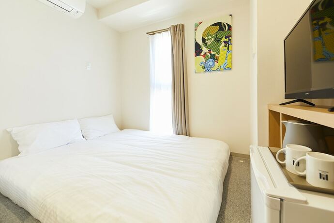 Imagen de la habitación del Hotel GATE STAY hotel Osaka Namba. Foto 13