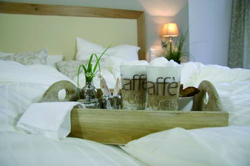 Imagen de la habitación del Hotel G&Auml;STEHAUS an der Sempt Ferienwohnungen & Apartements. Foto 16