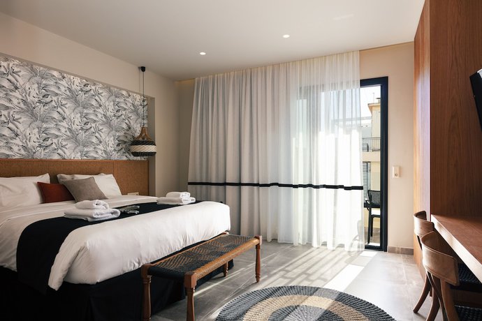 Imagen de la habitación del Hotel GD Gallery Suites. Foto 15