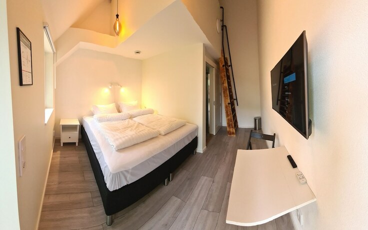 Imagen de la habitación del Hotel GEG. Foto 13