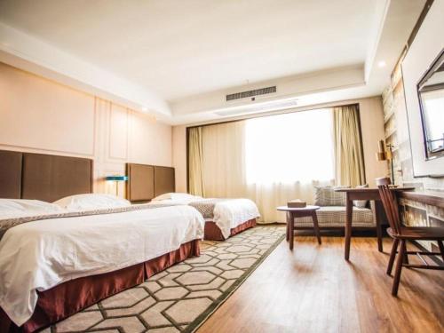 Imagen general del Hotel GEM Anqing Qianshan County Fortune Plaza. Foto 1