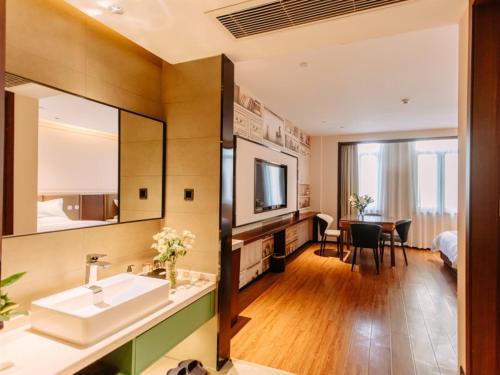 Imagen de la habitación del Hotel GEM Bozhou College. Foto 15