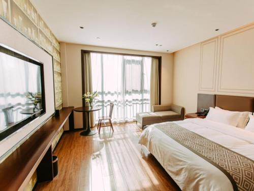 Imagen de la habitación del Hotel GEM Bozhou College. Foto 18