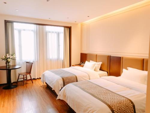 Imagen de la habitación del Hotel GEM Bozhou College. Foto 20