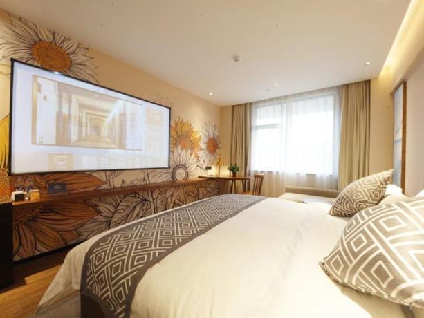 Imagen de la habitación del Hotel GEM HOTEL HEFEI SANXIAOKOU CITY GOD TEMPLE XINHUA. Foto 3