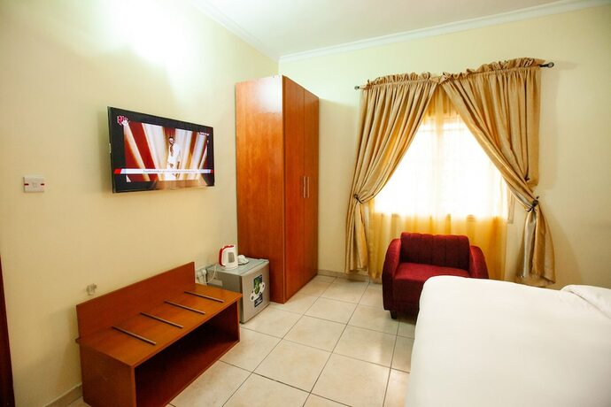 Imagen de la habitación del Hotel GENESIS JERSEY ESTATE. Foto 17