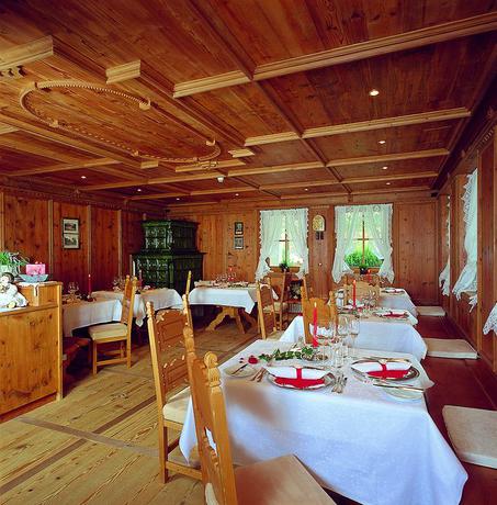 Imagen del bar/restaurante del Hotel GENZIANA, Dolomiti Superski. Foto 4