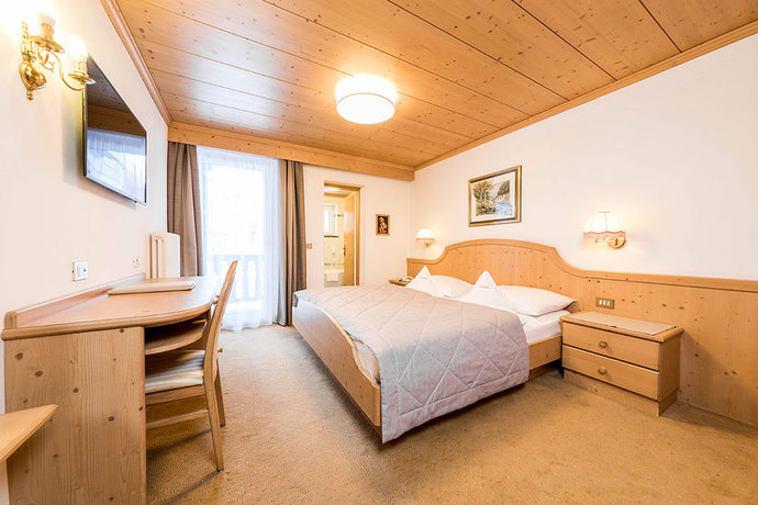 Imagen de la habitación del Hotel GENZIANA, Dolomiti Superski. Foto 6