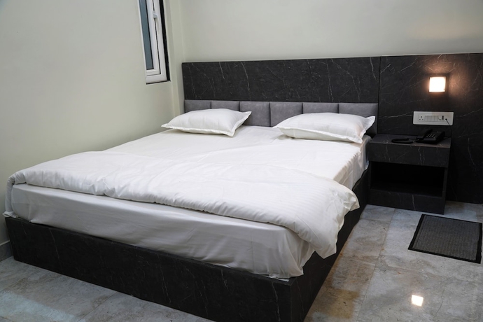 Imagen de la habitación del Hotel GG STAY INN. Foto 5