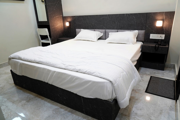 Imagen de la habitación del Hotel GG STAY INN. Foto 9