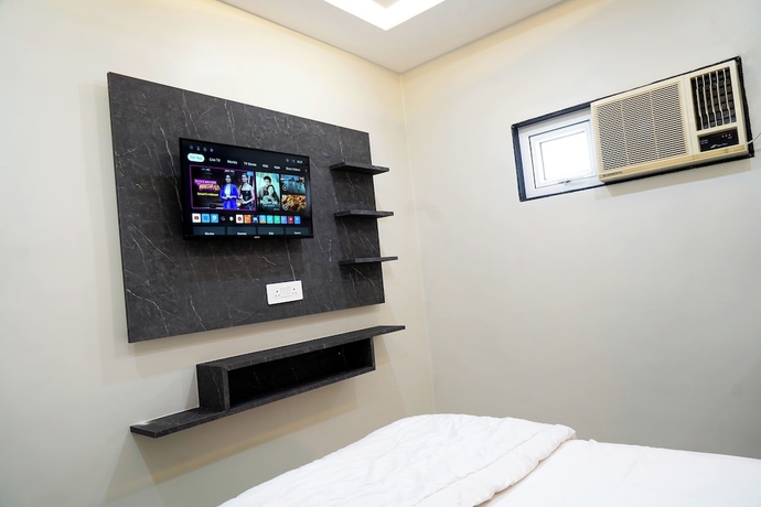 Imagen de la habitación del Hotel GG STAY INN. Foto 11