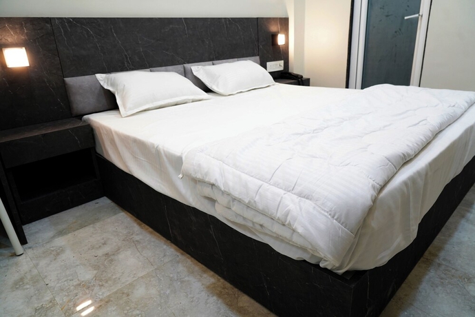 Imagen de la habitación del Hotel GG STAY INN. Foto 12