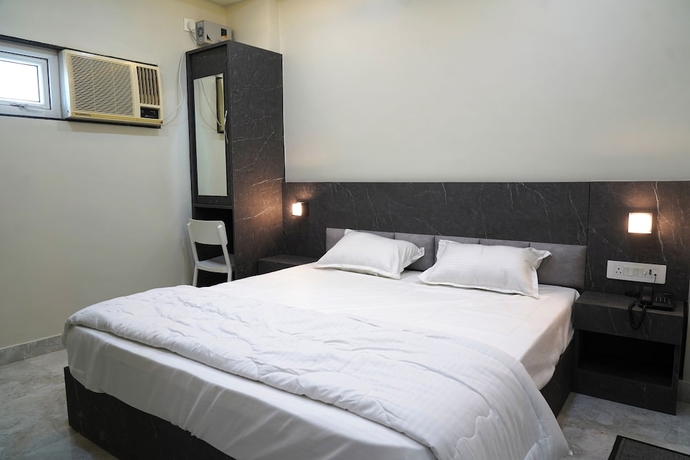 Imagen de la habitación del Hotel GG STAY INN. Foto 15