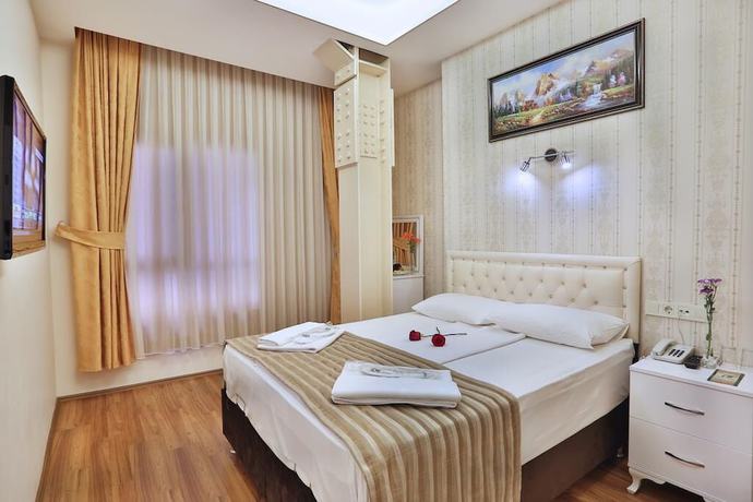 Imagen de la habitación del Hotel GH Taksim. Foto 3