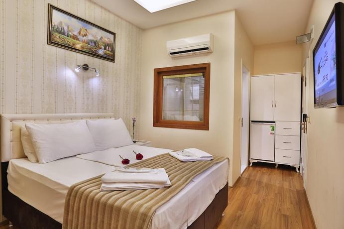 Imagen de la habitación del Hotel GH Taksim. Foto 4