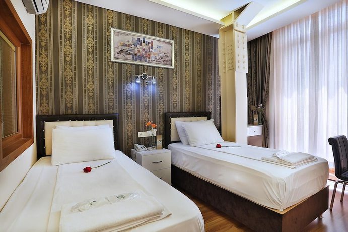 Imagen de la habitación del Hotel GH Taksim. Foto 5