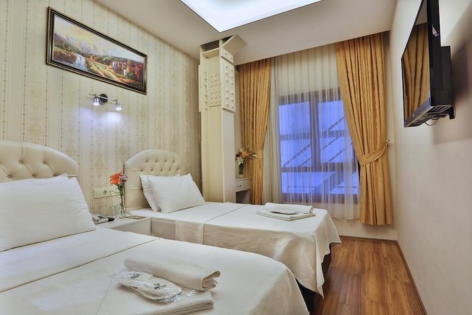 Imagen de la habitación del Hotel GH Taksim. Foto 6