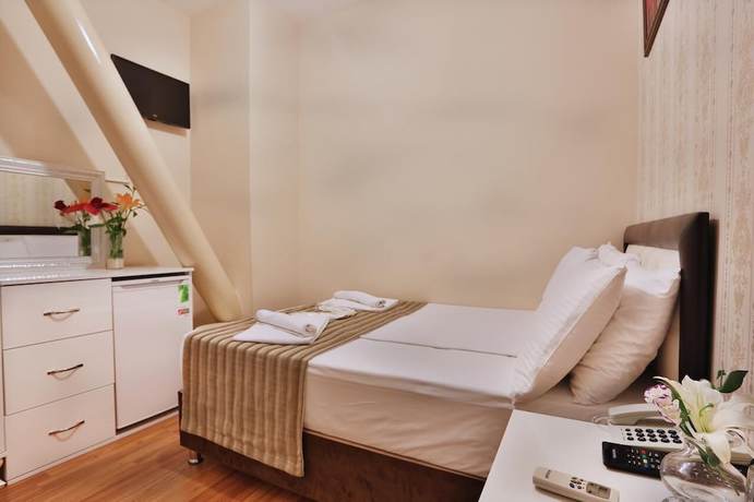 Imagen de la habitación del Hotel GH Taksim. Foto 7