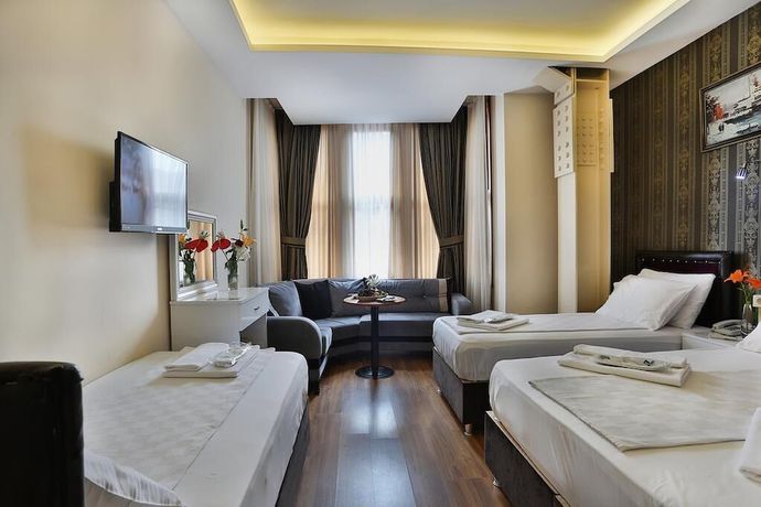 Imagen de la habitación del Hotel GH Taksim. Foto 8