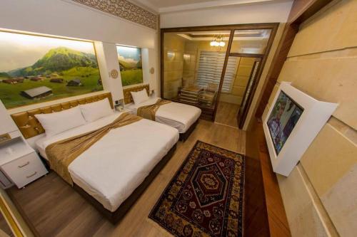 Imagen de la habitación del Hotel GHERDAN GOLD OTEL. Foto 20