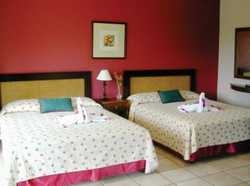 Imagen de la habitación del Hotel GIARDINI DI PAPAGAYO. Foto 2