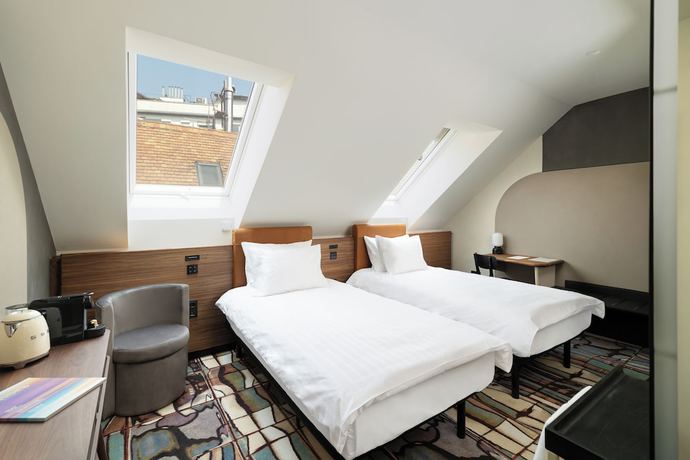 Imagen de la habitación del Hotel GIN Budapest. Foto 8