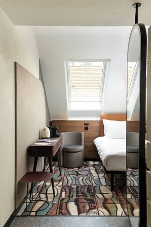 Imagen de la habitación del Hotel GIN Budapest. Foto 12