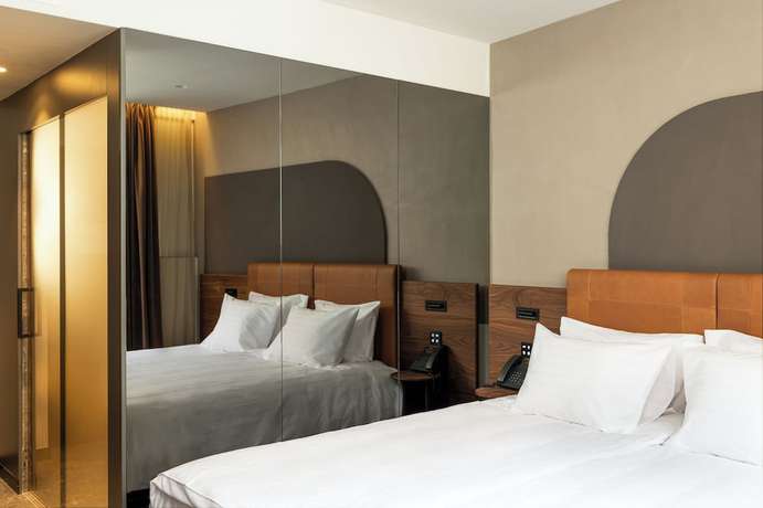 Imagen de la habitación del Hotel GIN Budapest. Foto 16