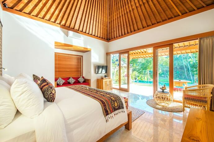 Imagen de la habitación del Hotel GK Bali Resort. Foto 19