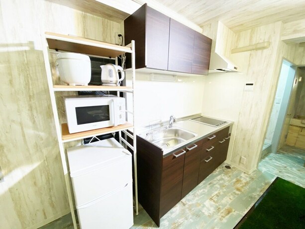 Imagen de la habitación del Hotel GLAMPEACE Katsushika Yotsugi. Foto 4