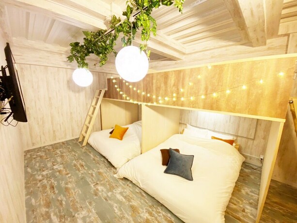 Imagen de la habitación del Hotel GLAMPEACE Katsushika Yotsugi. Foto 12