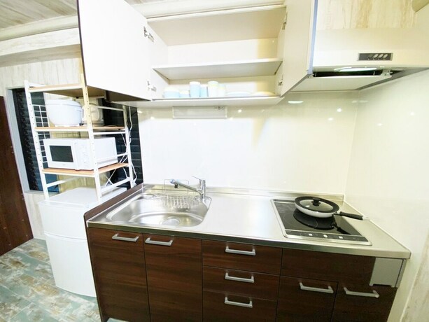 Imagen de la habitación del Hotel GLAMPEACE Katsushika Yotsugi. Foto 13