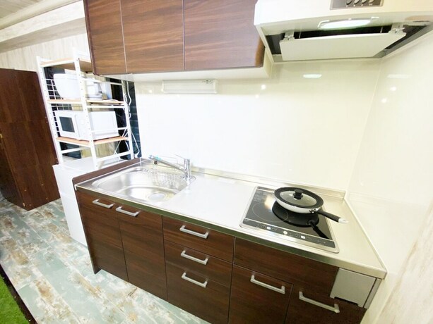 Imagen de la habitación del Hotel GLAMPEACE Katsushika Yotsugi. Foto 15