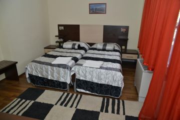 Imagen de la habitación del Hotel GLOBTOUR INN. Foto 11