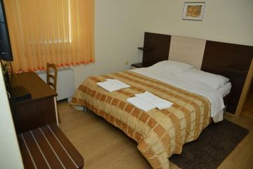 Imagen de la habitación del Hotel GLOBTOUR INN. Foto 14