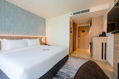 Imagen de la habitación del Hotel GLOW Bangkok Riverside. Foto 4