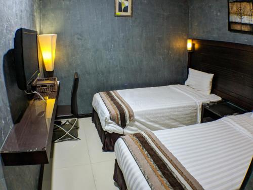 Imagen de la habitación del Hotel GM. Foto 5