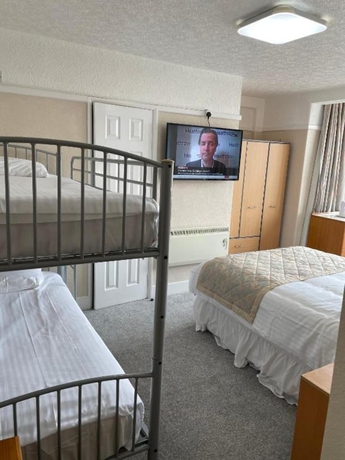 Imagen de la habitación del Hotel GNDJ. Foto 6