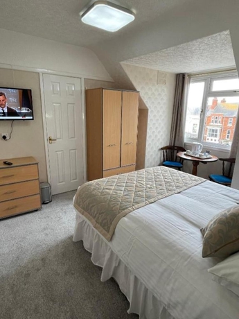 Imagen de la habitación del Hotel GNDJ. Foto 10