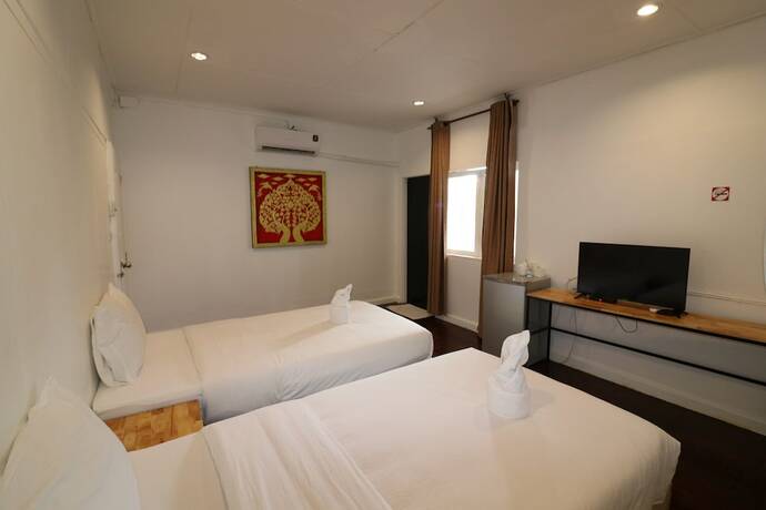 Imagen de la habitación del Hotel GO INN Thapae. Foto 4