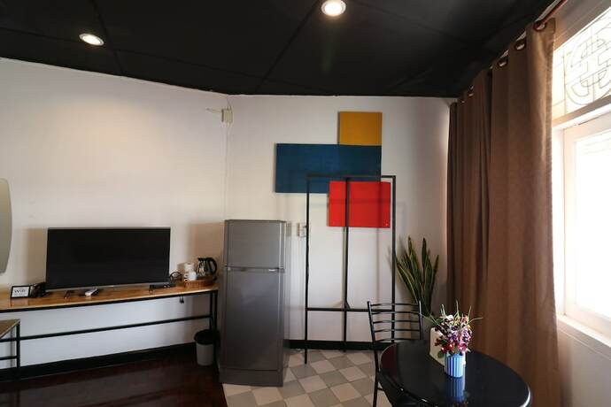 Imagen de la habitación del Hotel GO INN Thapae. Foto 7
