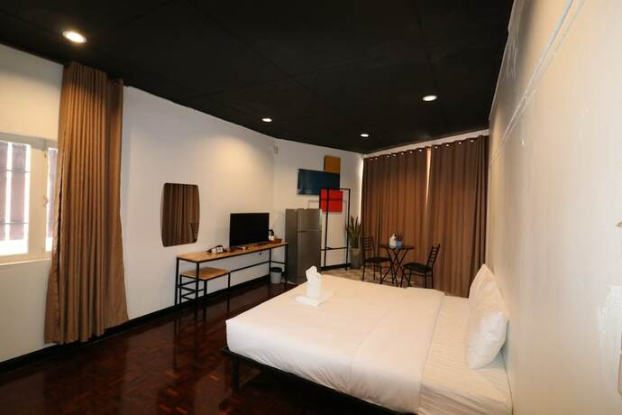 Imagen de la habitación del Hotel GO INN Thapae. Foto 10