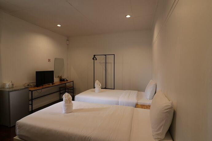 Imagen de la habitación del Hotel GO INN Thapae. Foto 12
