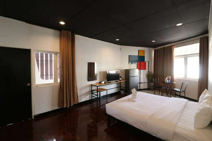 Imagen de la habitación del Hotel GO INN Thapae. Foto 13