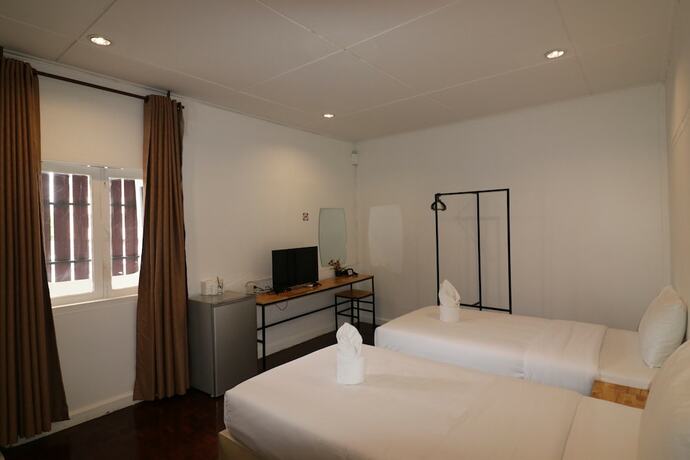 Imagen de la habitación del Hotel GO INN Thapae. Foto 17