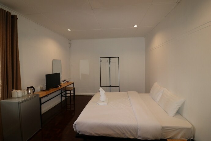 Imagen de la habitación del Hotel GO INN Thapae. Foto 18