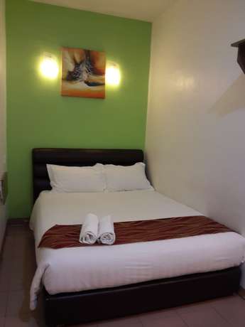 Imagen de la habitación del Hotel GOLDEN GATE HOTEL, Chukai. Foto 2