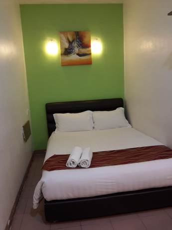 Imagen de la habitación del Hotel GOLDEN GATE HOTEL, Chukai. Foto 8