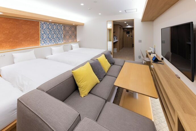 Imagen de la habitación del Hotel GOLDSTAY SAKAE. Foto 12